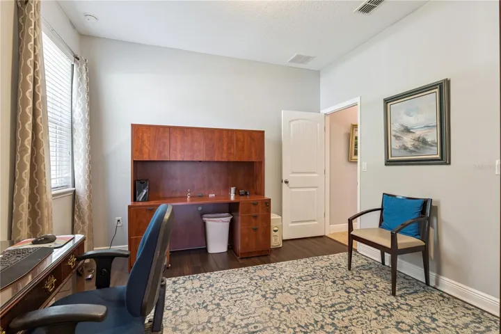 Bedroom with walk-closet used as an office