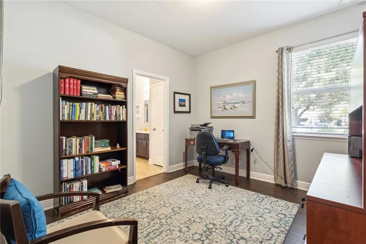 Bedroom with walk-closet used as an office