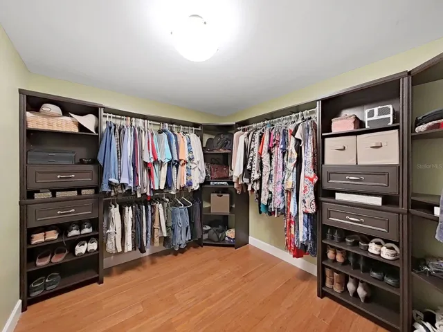 The Primary Suite walk-in closet in HUGE!!