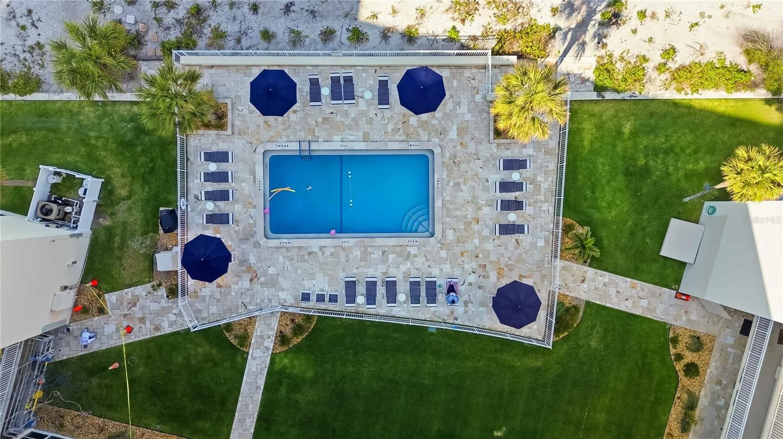 Large heated pool with outdoor shower