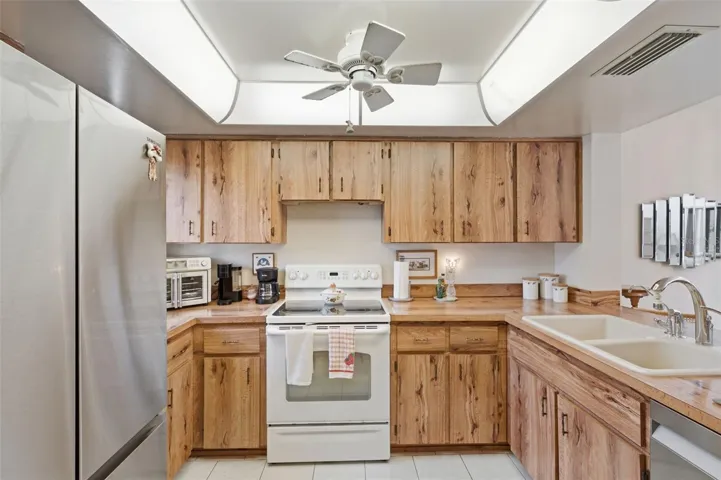 Newer stainless refrigerator and dishwasher