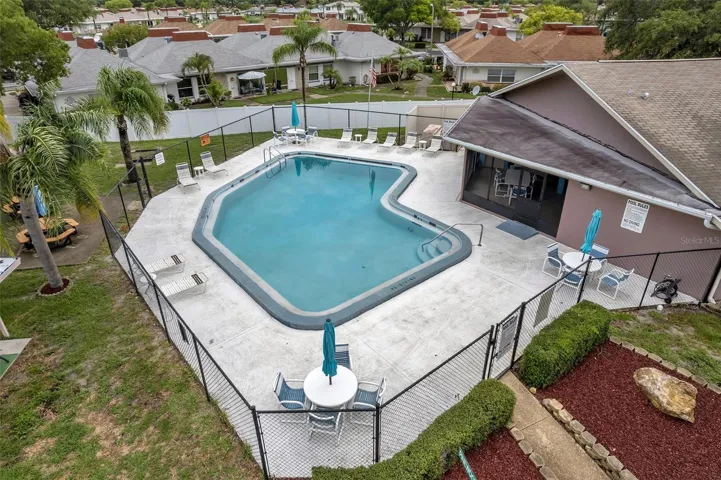The beautiful well maintained community pool and club house
