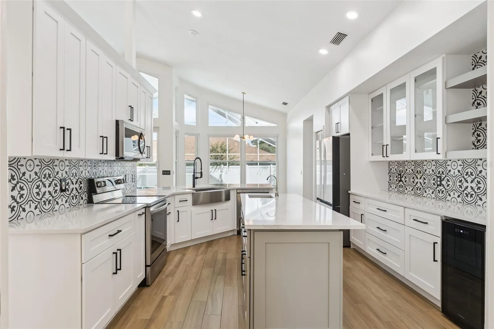 Kitchen with Custom Organizer Cabinets and Wine Refrigerator