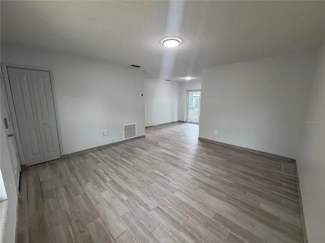 Living Large Living Room Opens To Dining Area