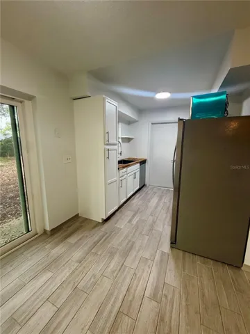 Updated Kitchen w/ New Cabinets and Stainless Appliances