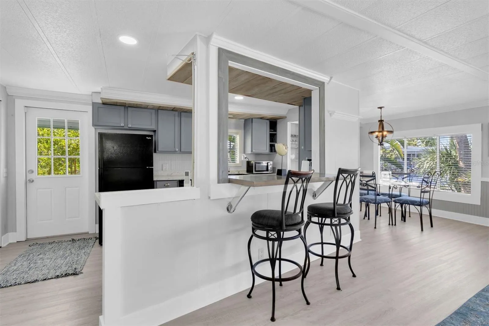 Seating area over looking the kitchen and living room area.