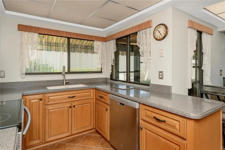 Kitchen with view to outdoor space and Florida room