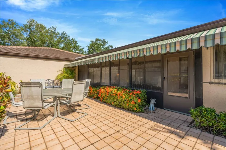 Private courtyard featuring easy-maintenance landscaping