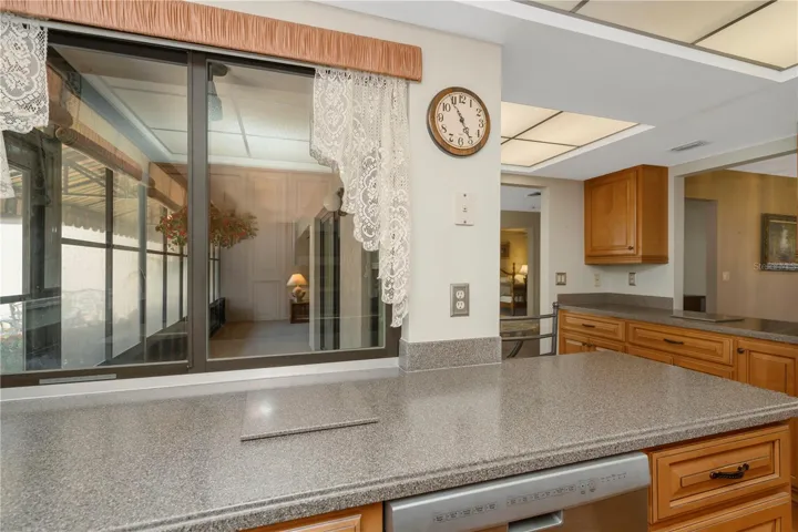 Kitchen with view into Florida Room