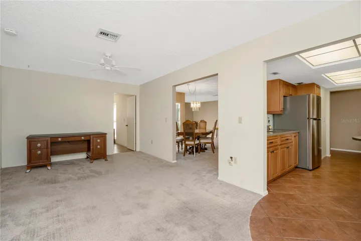 Living room looking into Kitchen and Dining room