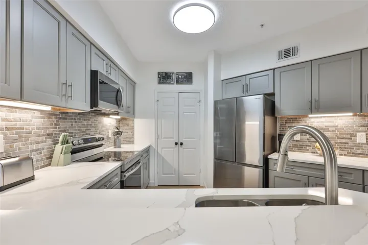 Kitchen with laundry room access