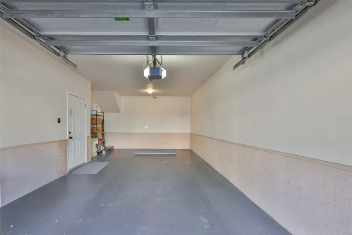 Over-sized garage with extra driveway parking space