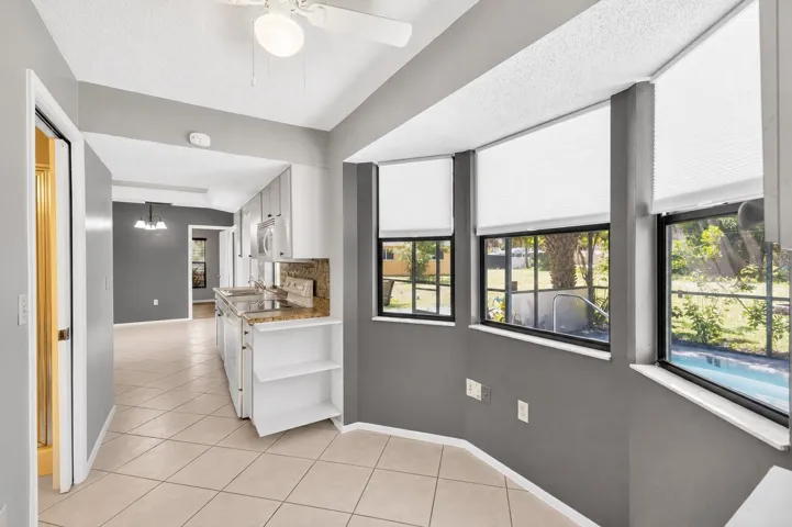 Bay Window Eat in Kitchen Space overlooking Pool