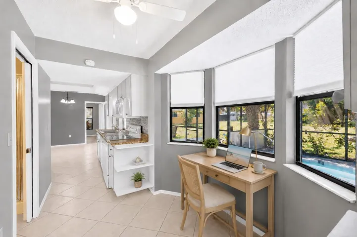 Virtually Staged as a Workspace overlooking Pool