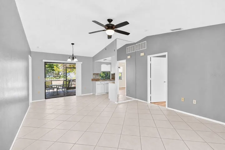 Large Living Space Looking to Back Slider/Kitchen/Dining