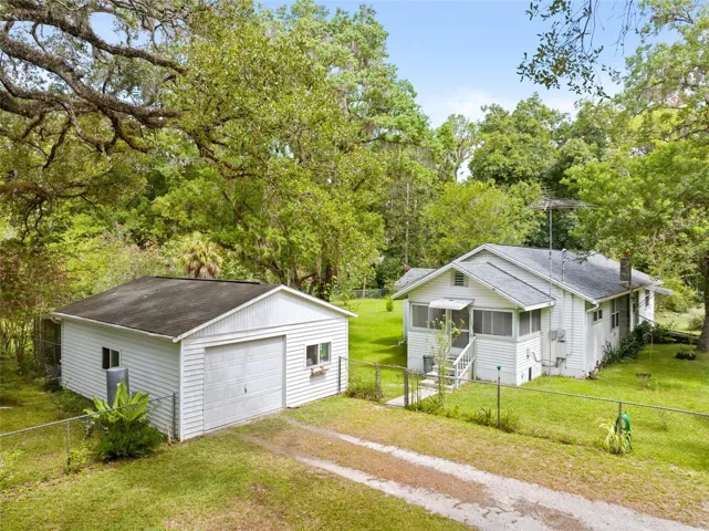 4/2/2 on .90 acre corner lot just outside city limits