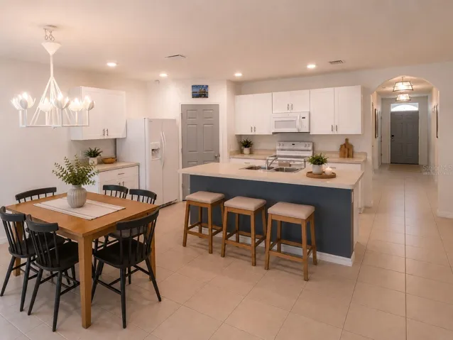 Virtually Staged dining area and kitchen