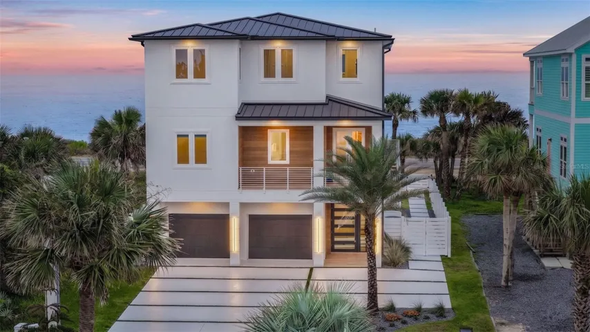 Welcome to 2214 N Central Ave, a shoreline masterpiece in the heart of Flagler Beach.