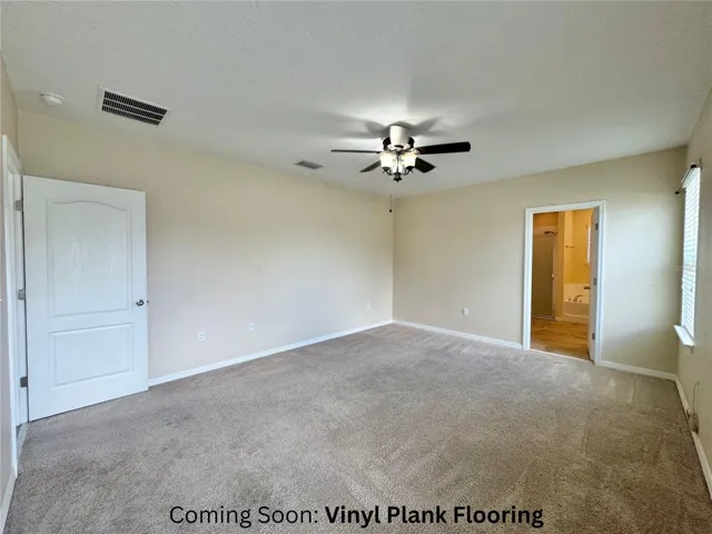 Primary *Vinyl plank flooring CURRENTLY being installed*