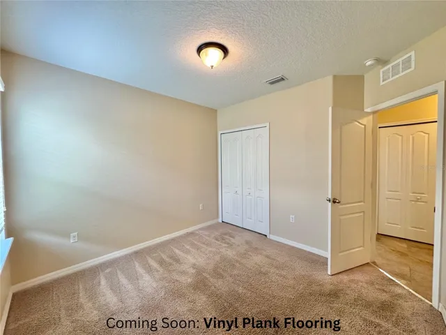 2nd Bedroom *Vinyl plank flooring CURRENTLY being installed*
