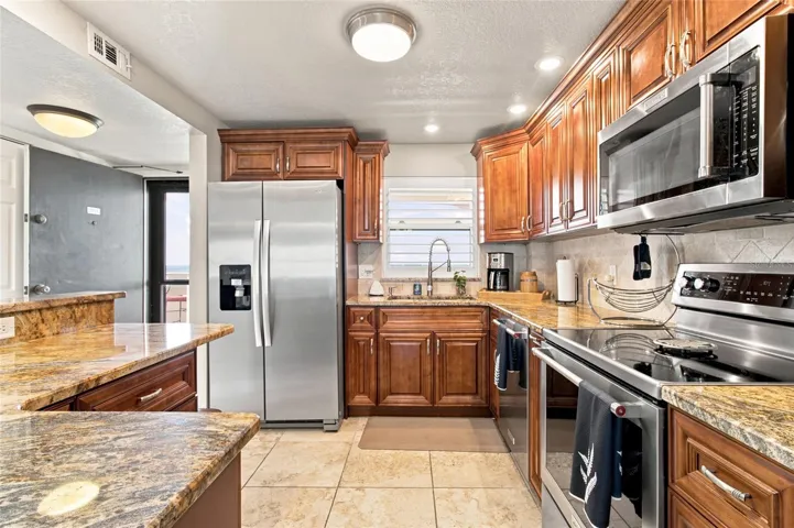 Remodeled Kitchen with Intracostal views and front patio! SS Appliances