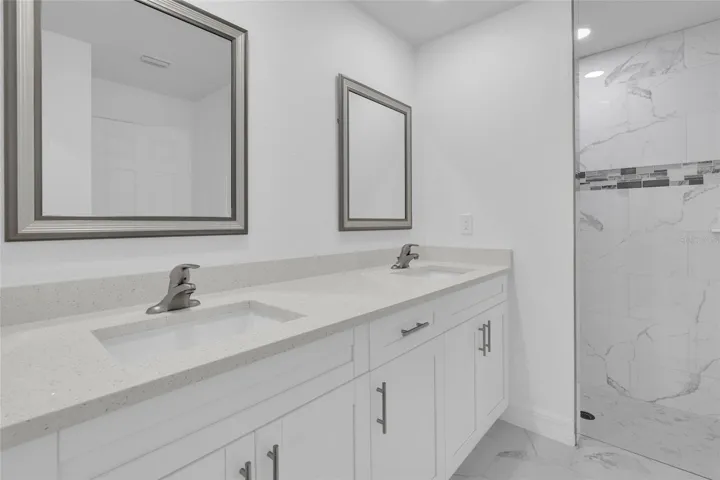 Master bathroom dual sinks and shower