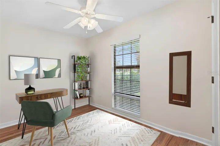 Virtually staged 3rd bedroom, staged as office.