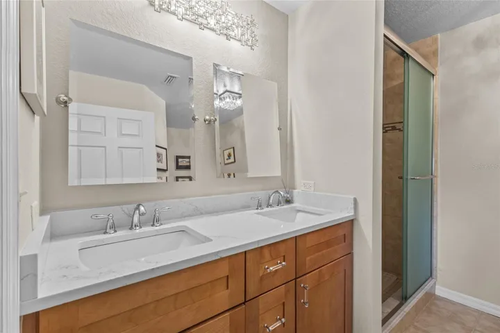Dual sinks in the primary bath with walk in shower