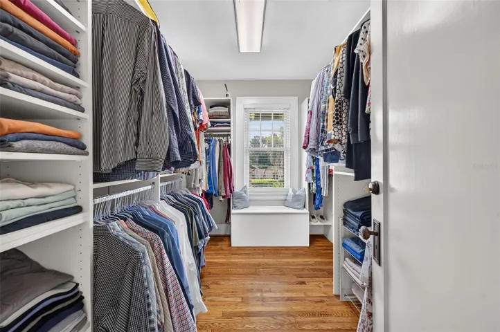 Custom walk-in closet adjacent to primary suite