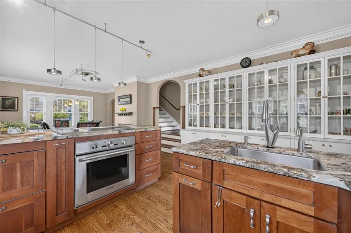 Great design for entertaining with open kitchen, dining, and adjacent family room