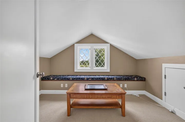Closet/sitting room in attic bedroom suite