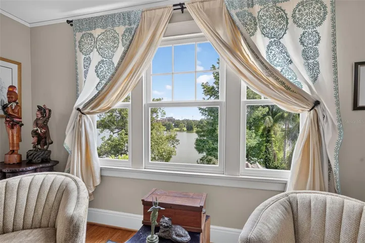 Beautiful lake views from primary bedroom sitting area