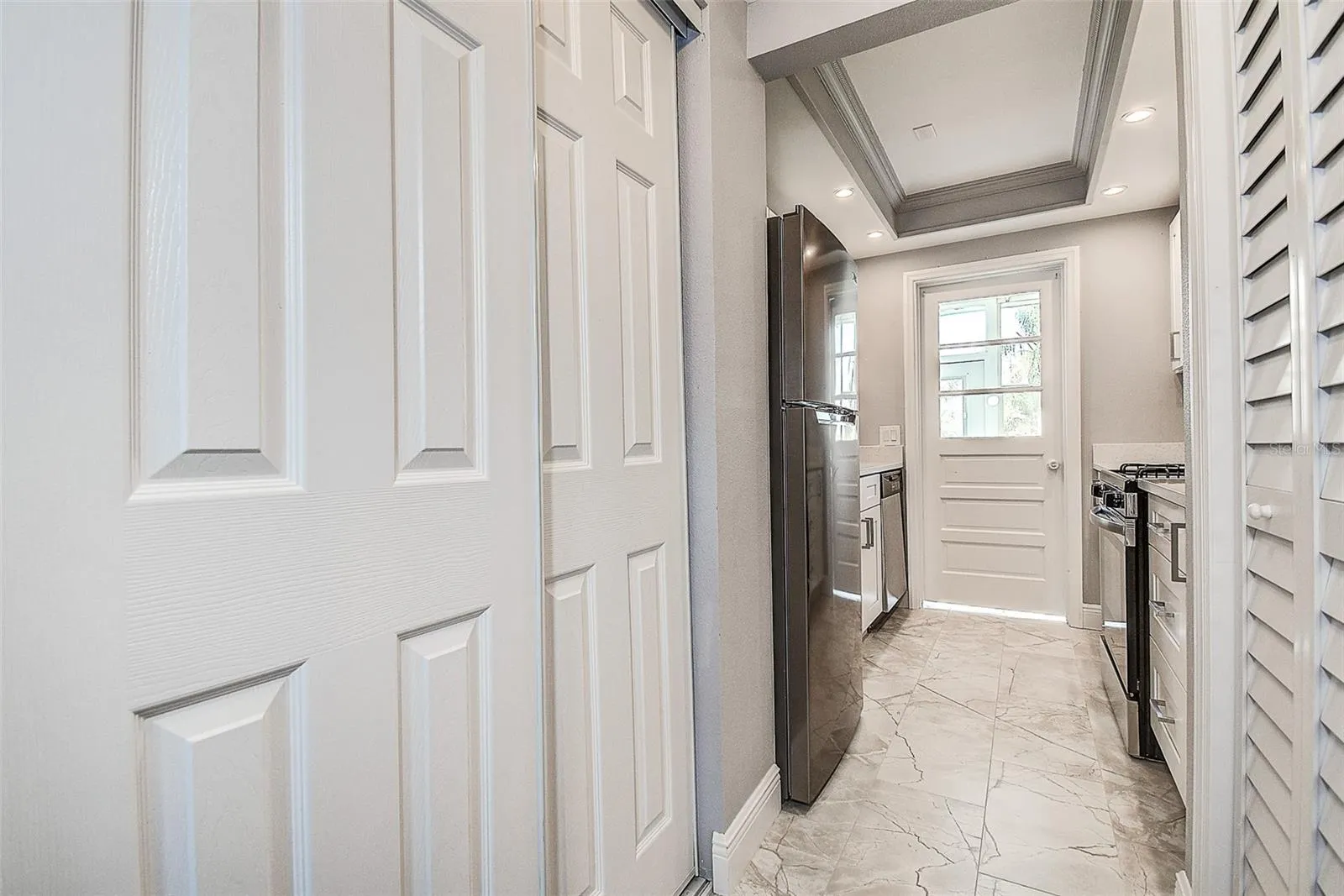 Kitchen Entry w/ Pantry/Storage Closets