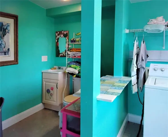 Divider between half bath and laundry room