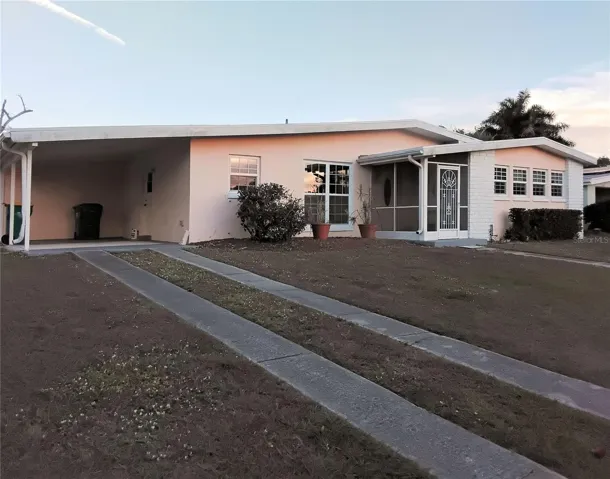 Front of house from left side of front yars