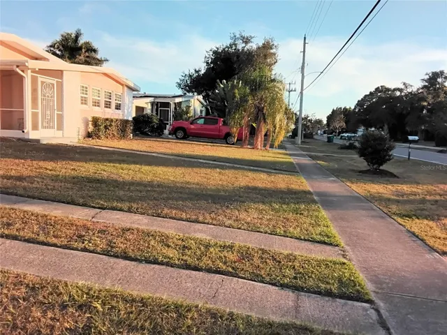 Front of house looking from left side of front yard