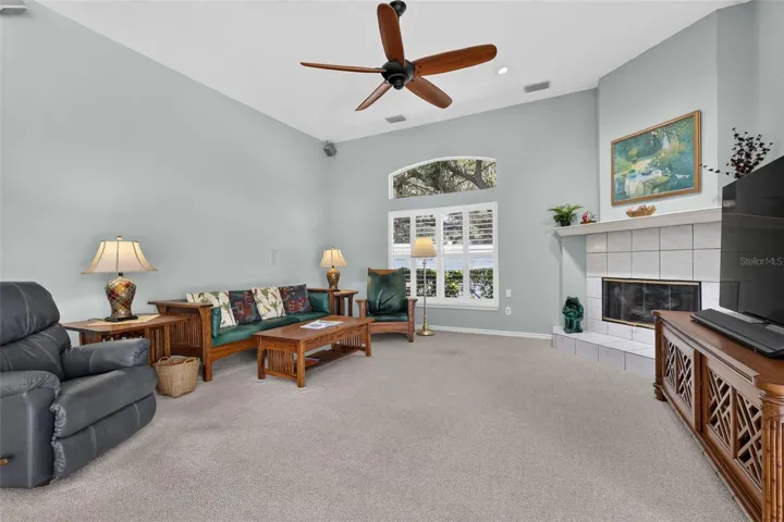Family room with fireplace, Plantation shutters