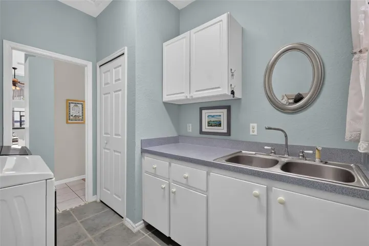 Laundry sink, countertop and utility/linen closet