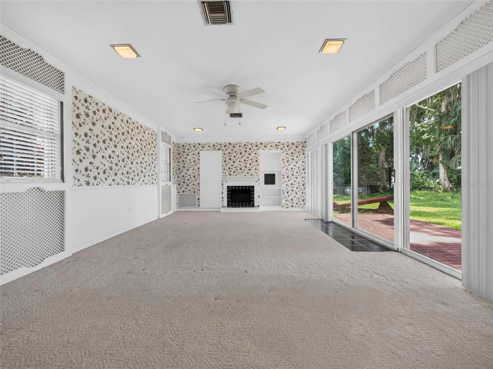 Bonus Room 2 with sliders and access to lake.