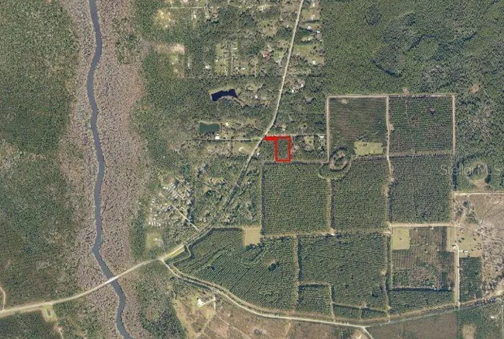 Aerial Photo showing location of Property close to the Ocklawaha river and Sharps Ferry Bridge - lower left or southwest of property.