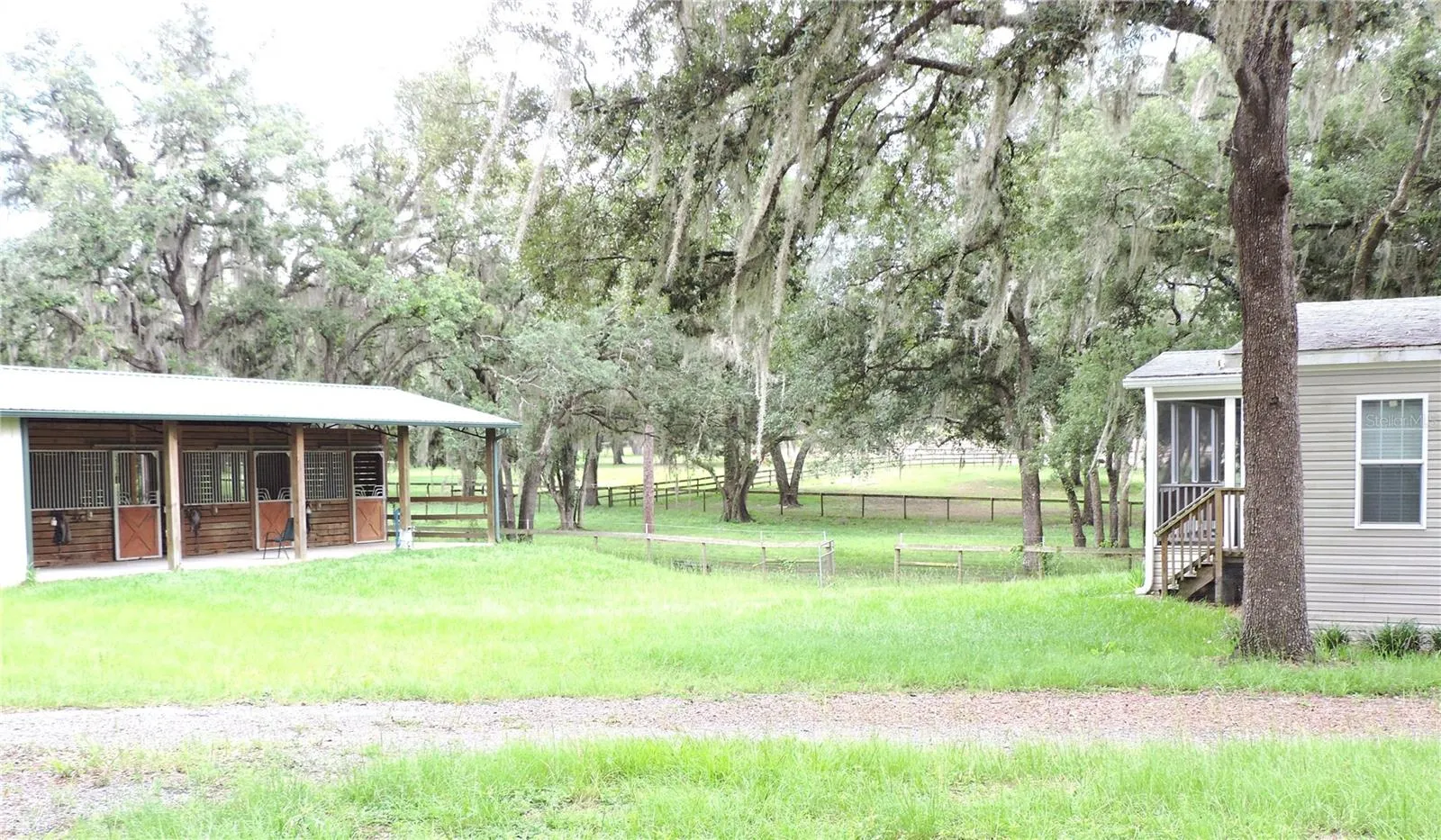 side porch overlooks barn