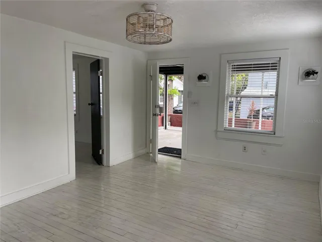 Living room view to entrance door/porch