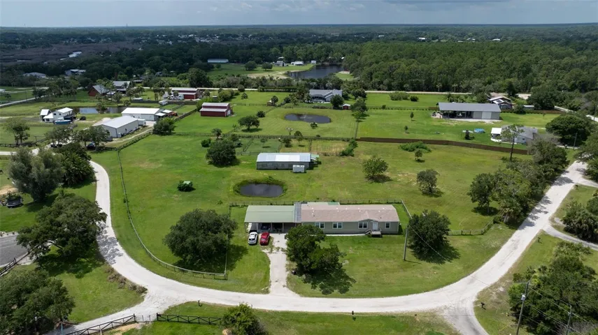 Country setting on 3.63 acres close to everything!