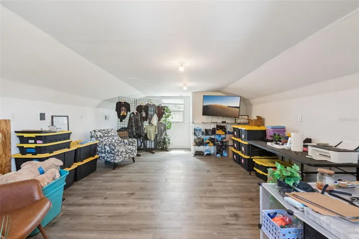 Spacious upstairs air conditioned office or flex space inside the detached barn.