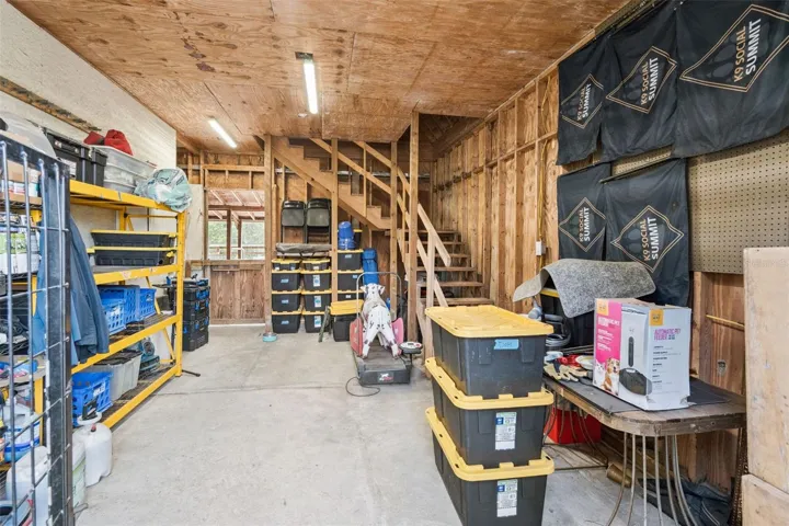 Barn workshop and storage area with room for equipment, tools, hobbies, or business use.