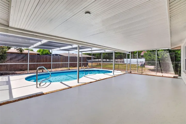 Pool/Rear Covered Screened in Patio