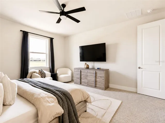 Primary suite overlooking the pond.