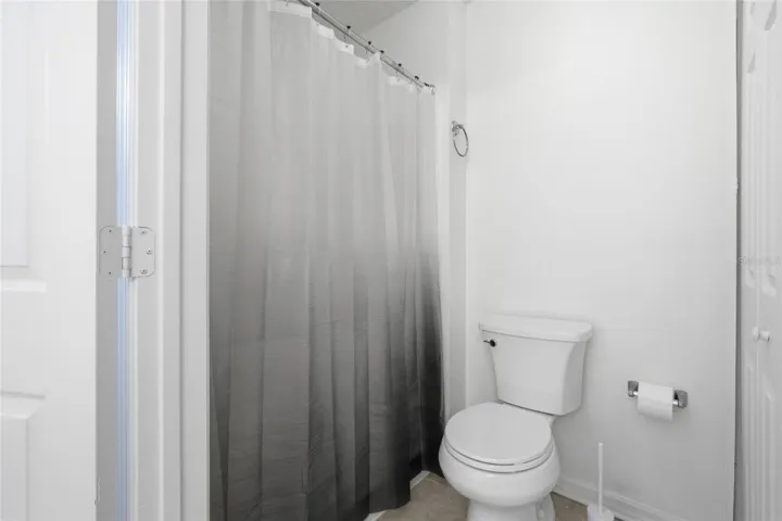 Primary downstairs bathroom with private shower