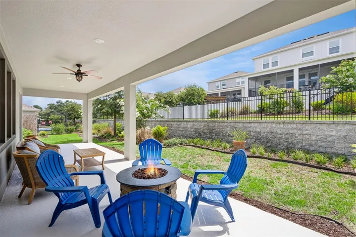 Covered rear porch with room to gather