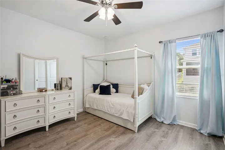 Additional upstairs bedroom with natural light